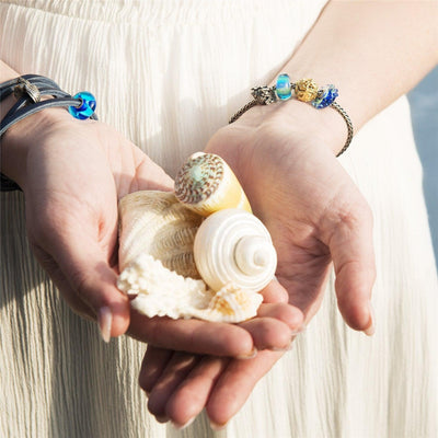 Rejtőzködő kagyló Bead - Trollbeads Ékszerek Magyarország